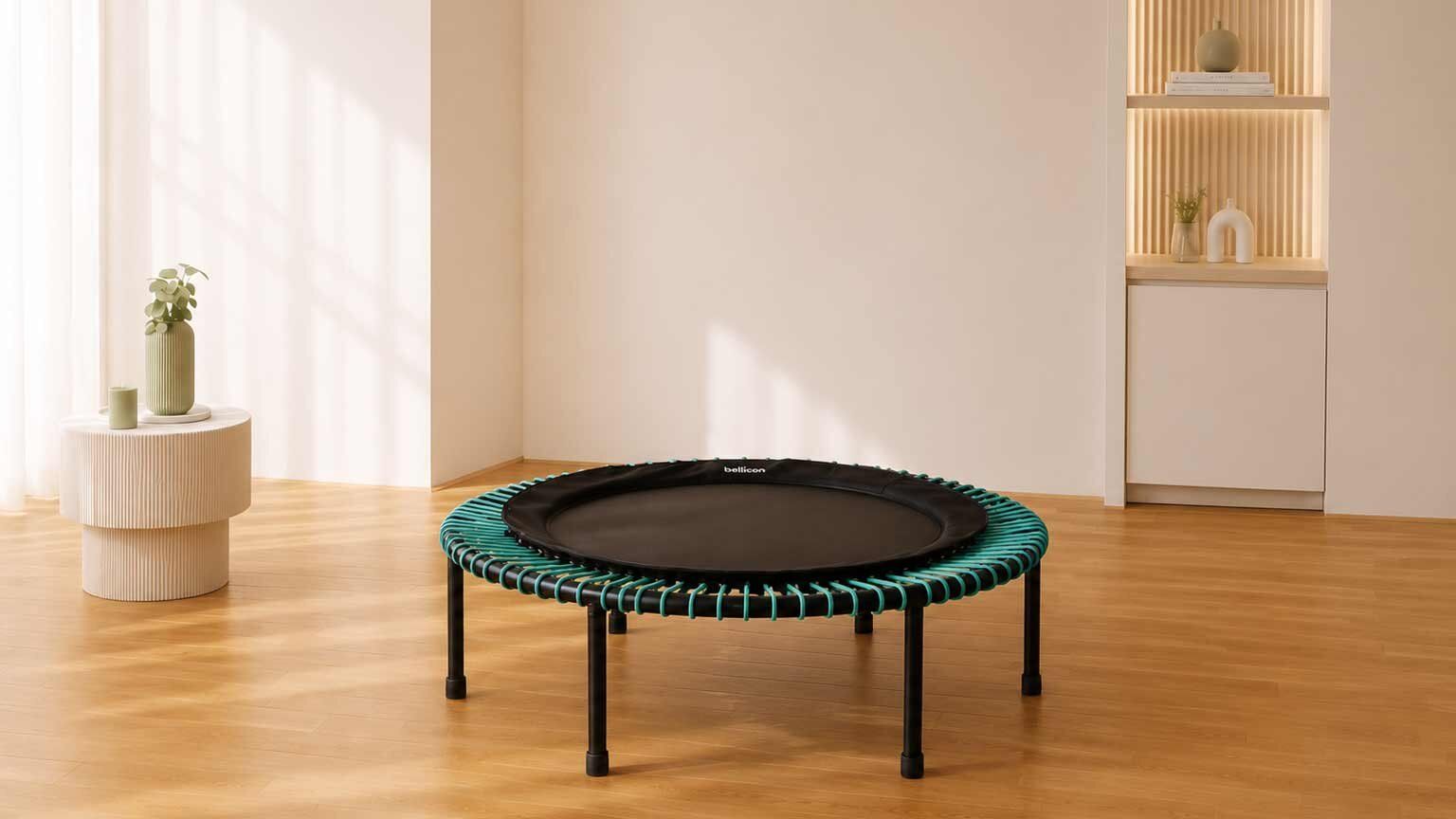 A bellicon rebounder set up in a bright, minimal home.