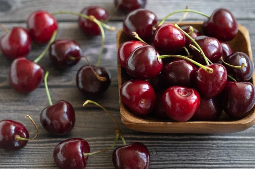 Cherries on plate icon.