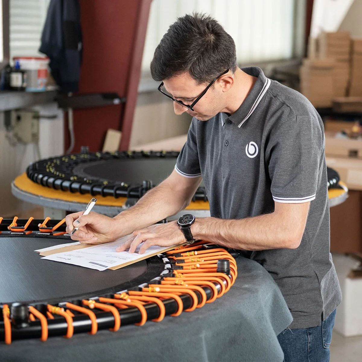 A bellicon team member inspects the refurbished models.